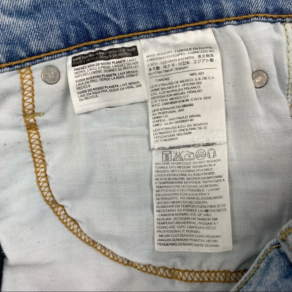 Levi’s 513 Slim Straight Distressed Light Wash Jeans - Picture 11 of 16